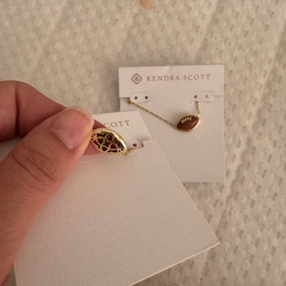 Kendra Scott 14k Plated Gold and Orange Sandstone Football Pendant Necklace - Picture 4 of 13